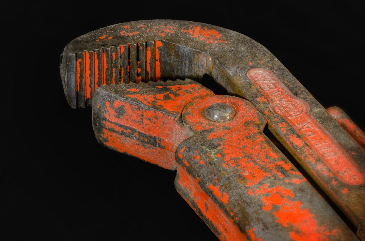Contractor repairing pipes
